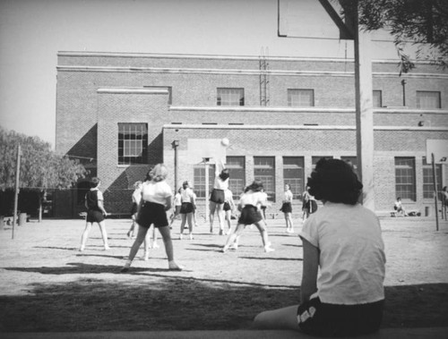 Students play volleyball at John Marshall High School