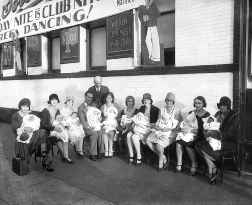 Mothers and babies at dance hall