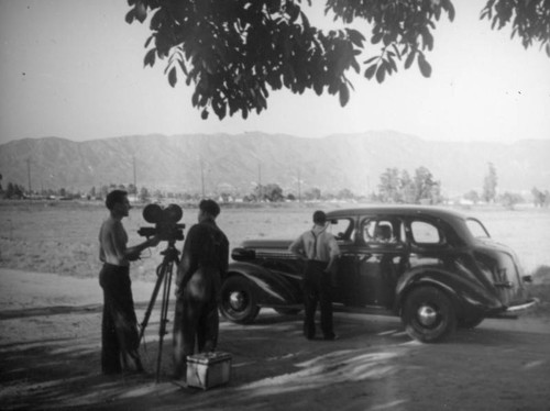 Filming a car and field