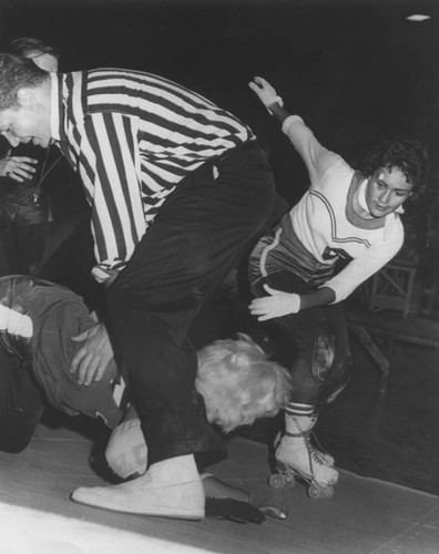 Roller Derby girls battle it out