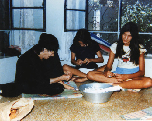 Iraqi grandmother with granddaughters