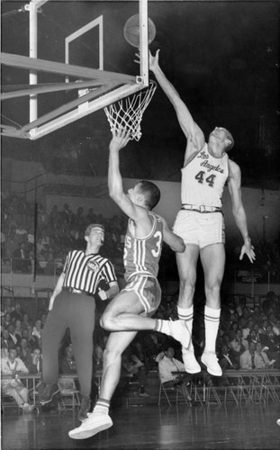 Jerry West blocking shot