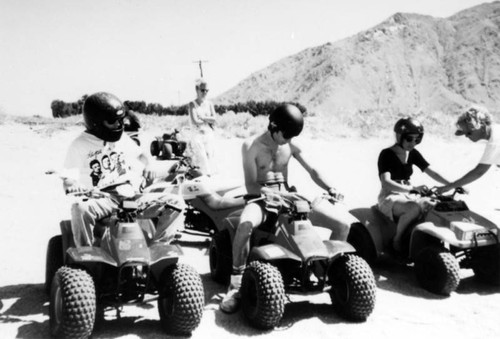 Riding ATVs in the desert