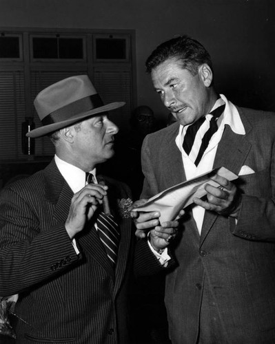 Errol Flynn and George Jessel