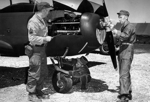 Maintenance operation by three of 40th Armored's Aviation Unit