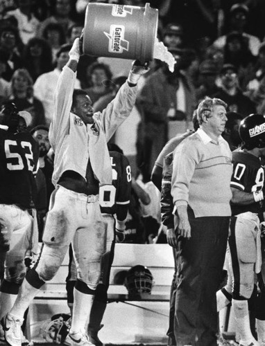 Coach Parcell in for a drenching — Calisphere