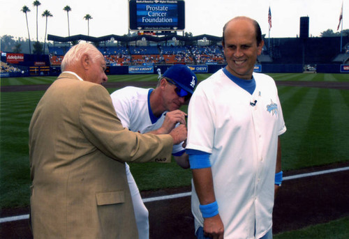 Tommy Lasorda, Jim Tracy and Michael Milken at Dodger Stadium