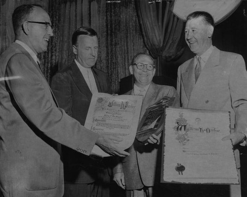 Chief Parker is honored with three scrolls