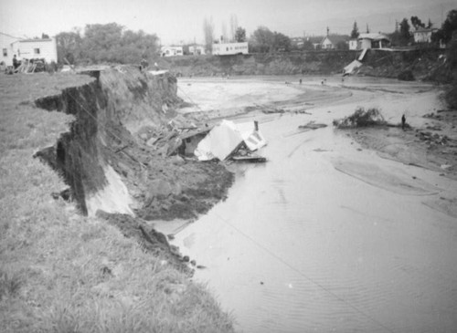 L.A. River flooding, cables to the riverbed in North Hollywood