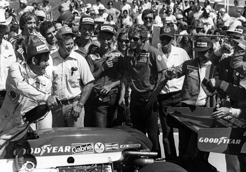 Unser and crew celebrates win