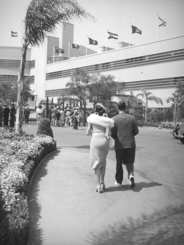 Couple arriving at Hollywood Park