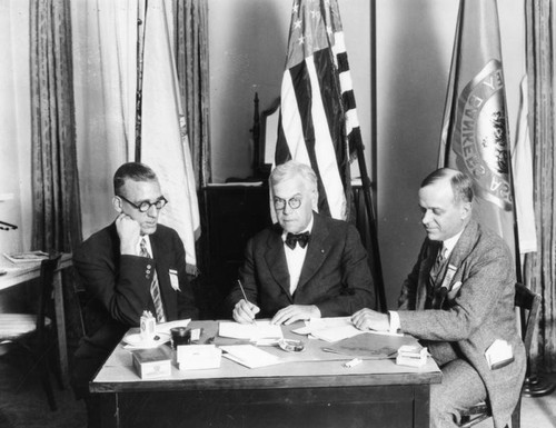 Delegates at desk