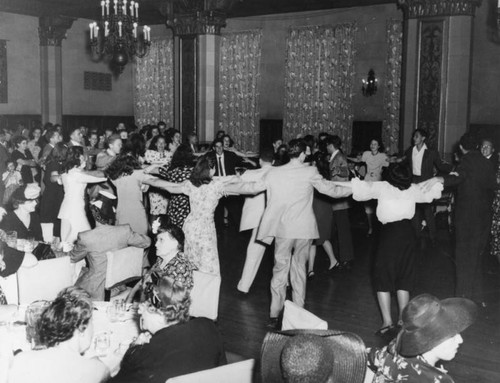 Dancing the "hora" at a wedding celebration