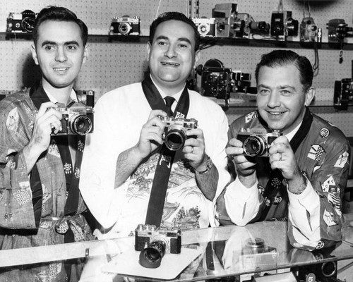 Camera store owners in Japanese garb