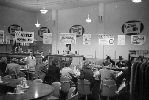 Customers at a Currie's Ice Cream parlor