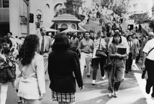 People crossing 5th Street