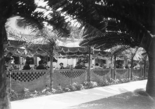 Diners seated in an outdoor patio