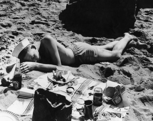 A nap after a meal on the beach