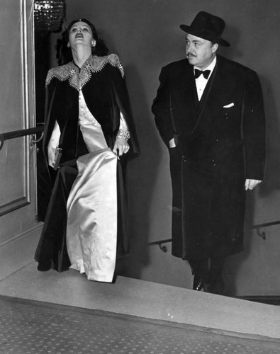 Hedy Lamarr and husband arriving at Academy Awards banquet