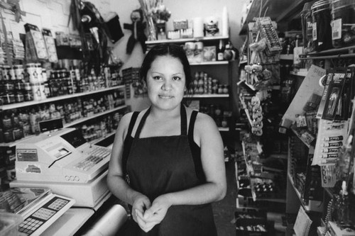 Woman cashier in market, Echo Park