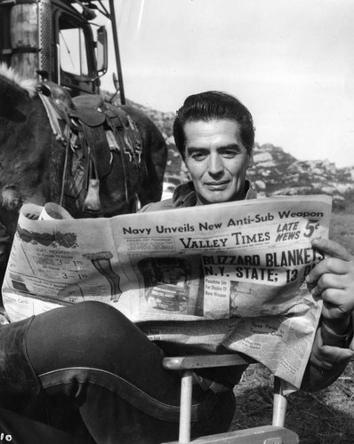 "Escort West" star Vic Mature, reads Valley Times