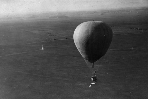 Balloon in flight, seen from the air