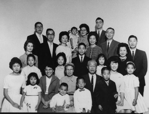 Korean American grandparents with family