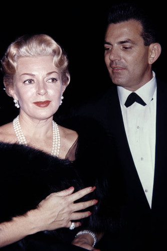 Lana Turner and Fred May attend a movie premiere