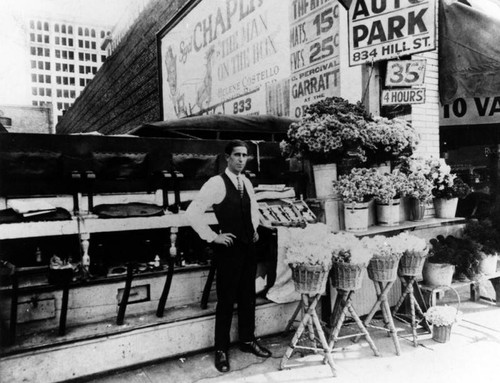 Shoe shiner and flower vendor