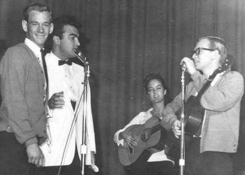 Iranian American with folk singers