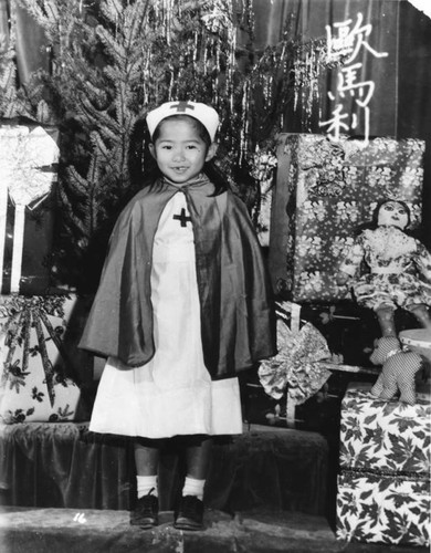 Chinese American girl in nurse costume