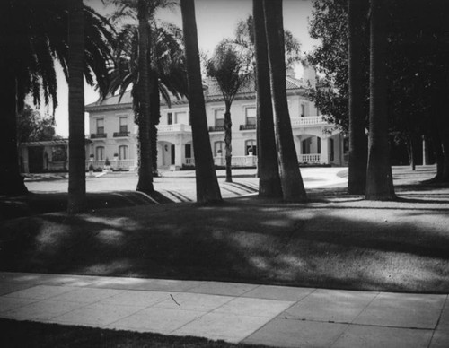 Wrigley Mansion surrounded by palms