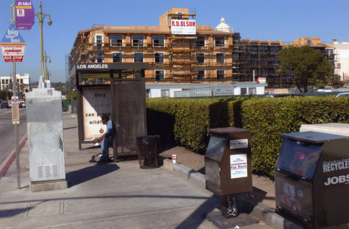 Mozaic apartments behind bus stop