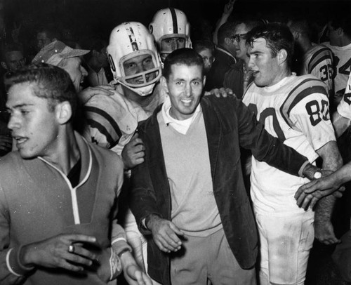 Victorious Parrots congratulate coach