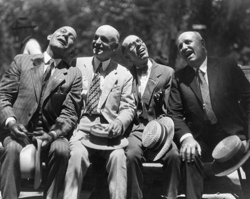 Men singing at picnic