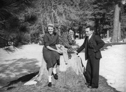 Big Pines Recreation Camp, Ethel Schultheis on a stump with friends