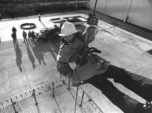 Repelling down a four-story building