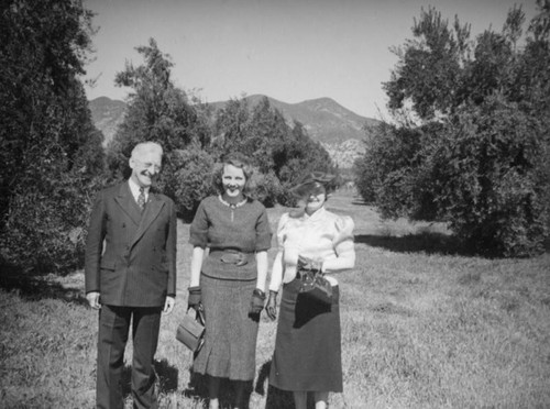 Ethel Schultheis with the Jones, Silva Olive Plant