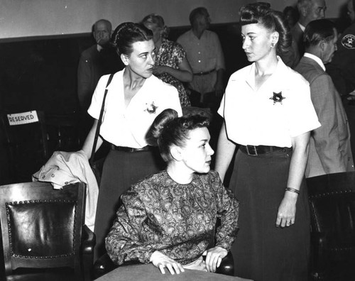 Barbara Graham and two women officers