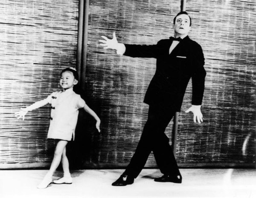 Child actress performing with Gene Kelly