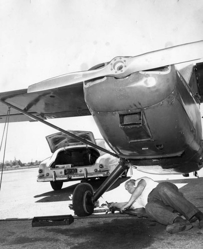 Valley pilot works on ship