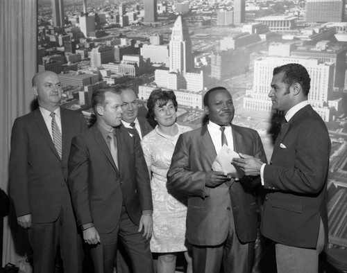 Billy Mills and unidentified group