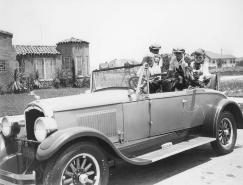 Children and dog in car