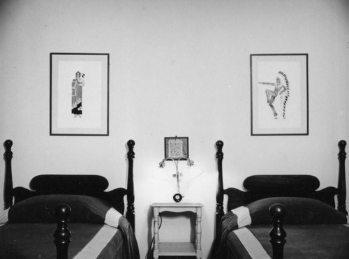 Schultheis' bedroom, twin beds and paintings