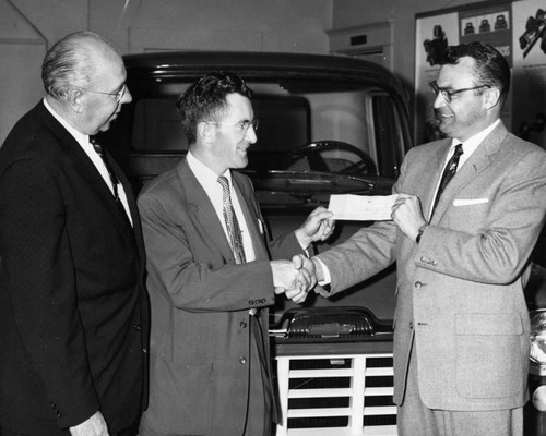 Receives salesman's grand award