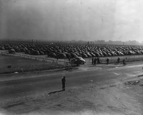 Soldiers guard parked cars and entrances