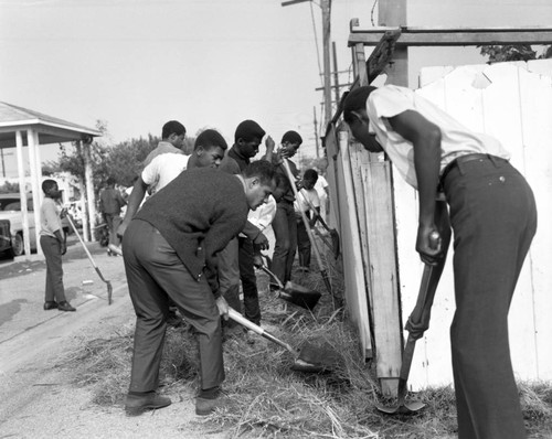 Councilman Billy Mills works with Civilian Conservation Corps