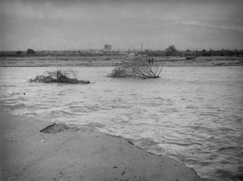 Swollen river during the floods in El Monte