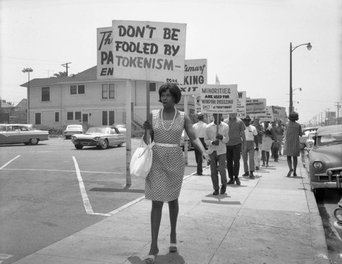 Demonstrators outside the Thriftimart