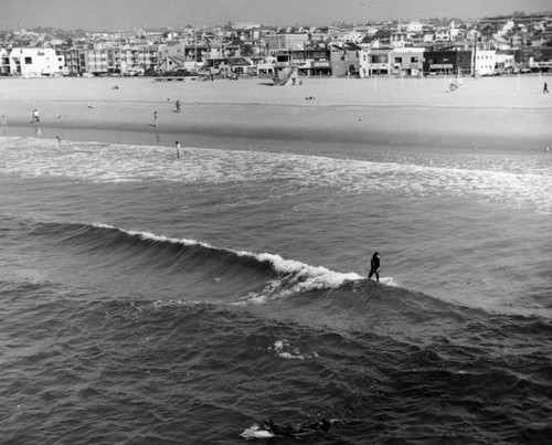 Board surfing at Hermosa Beach, view 3